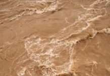 Floodwaters leave man stranded