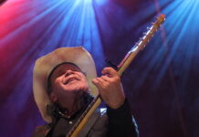 Students share the stage with star