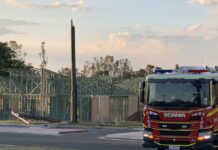 Snapped pole shuts road