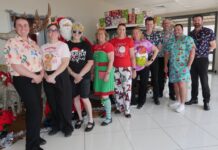 Ken Mills team shares Christmas cheer